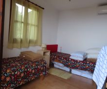Huis te koop met zicht zee slaapkamer met 2 bedden Kalamos Griekenland