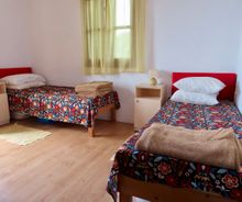 Huis te koop slaapkamer met 2 bedden Kalamos Griekenland